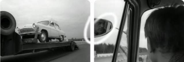 В зеркале заднего вида автомобиля Деточкина отражается лицо оператора. 
